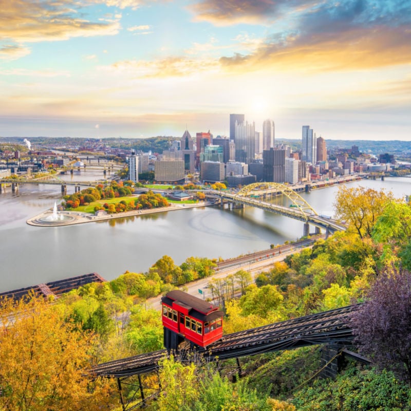 Downtown skyline and vintage incline in Pittsburgh, Pennsylvania, USA at sunset