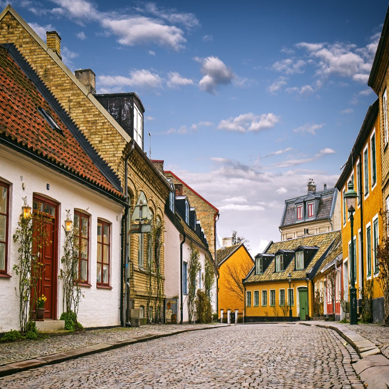 A street with old buildings in the city center of Lund, Sweden