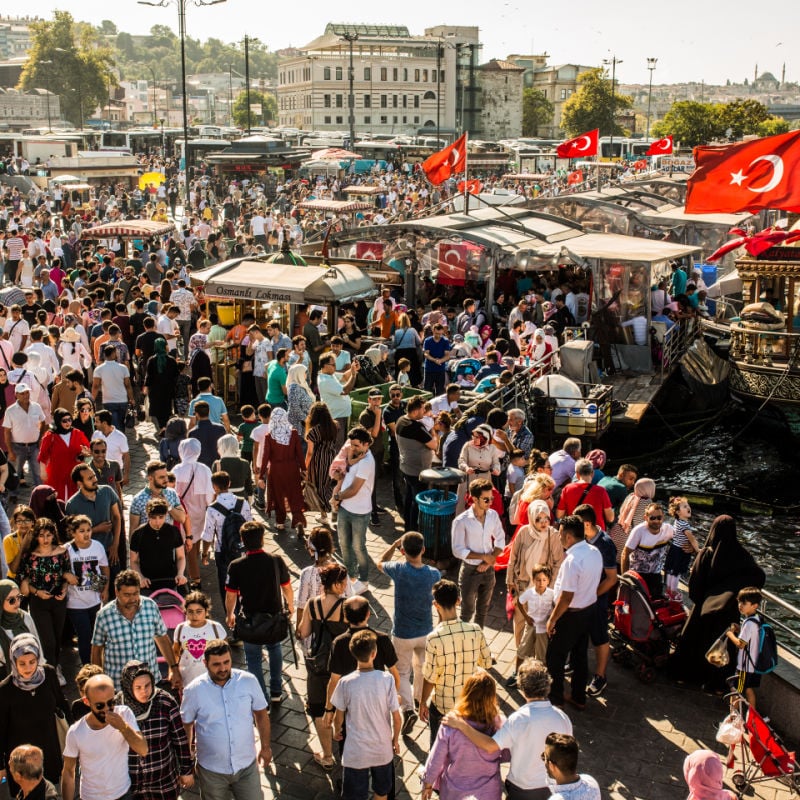 Many people full of tourists in Eminonu Istanbul Turkey