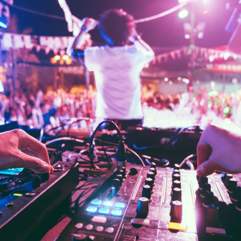 A DJ at a beach party in Ibiza. 